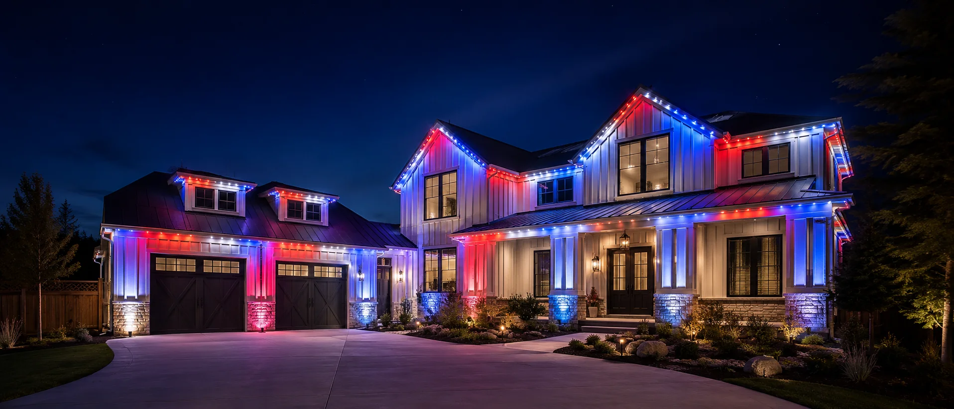 Red, white, and blue permanent roofline lighting on a Utah home at night